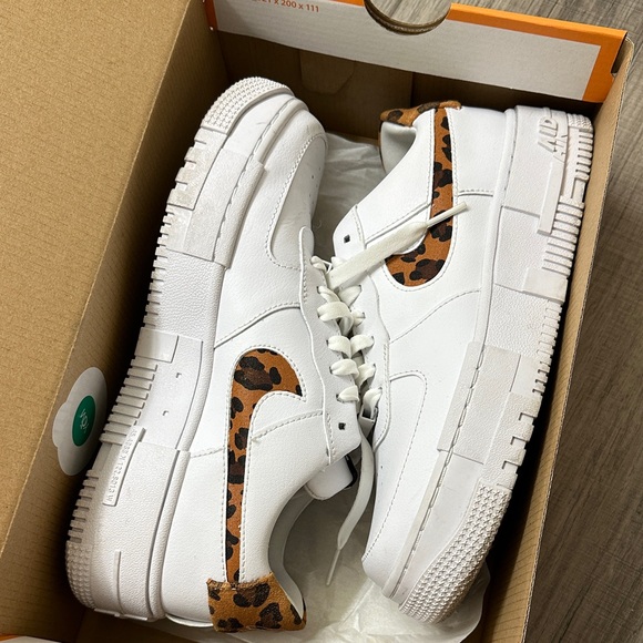 Nike Shoes - Nike White Sneakers with Leopard Swoosh Accent
